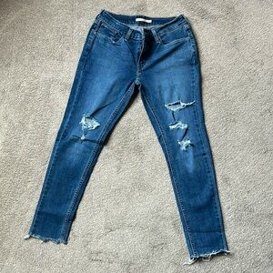 Levi 535 Super Skinny ripped jeans
